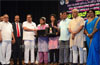 Minister Basavaraja Rayareddy distributes free laptops to SC/ST students